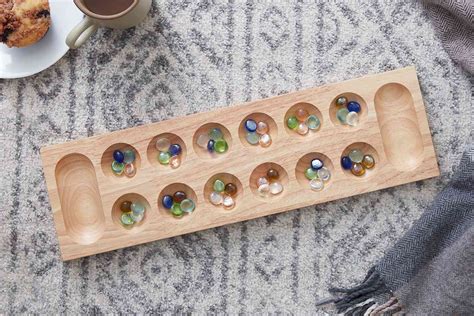 How to Play Mancala .